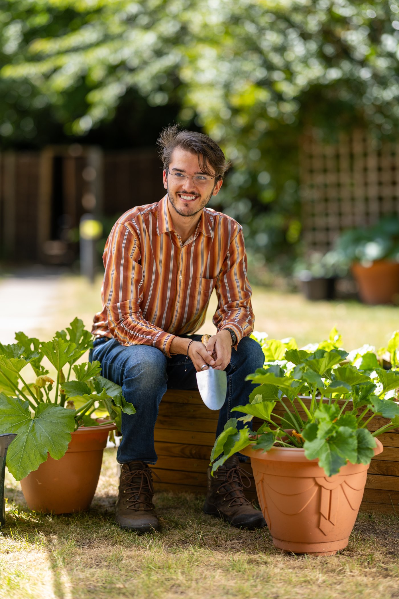 Emilio Garcia Padron, founder of NEA Tech Studio, in a community garden
